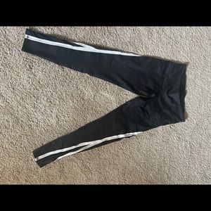 Champion workout pants with white strip on side.